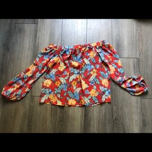 Long sleeved cold shoulder floral blouse